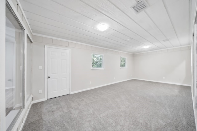 basement featuring carpet flooring