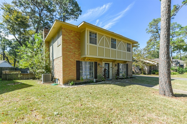 view of front facade with central AC and a front lawn