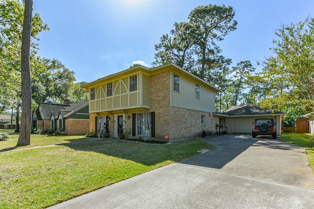 view of front of house with a front lawn and a garage