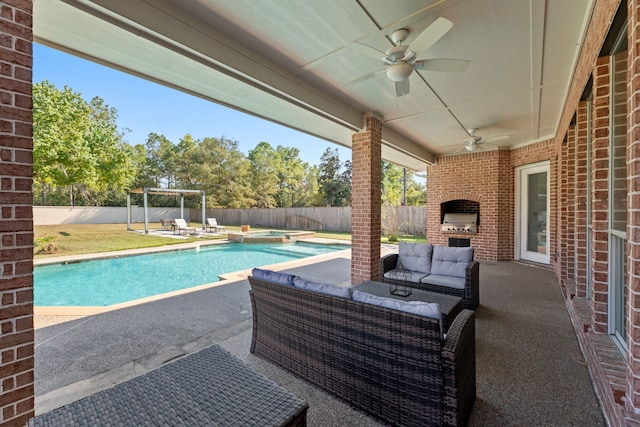 view of swimming pool featuring an outdoor hangout area, a patio, and ceiling fan