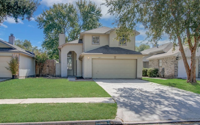 view of property with a front yard and a garage