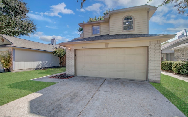 garage featuring a yard