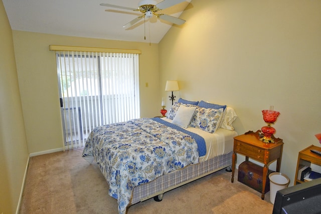 carpeted bedroom featuring ceiling fan and vaulted ceiling