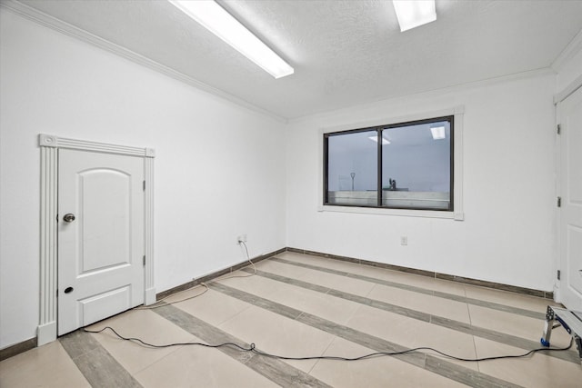 11126 Timber Crest Dr, Houston, TX 77065 - unfurnished room with baseboards, a textured ceiling, and crown molding