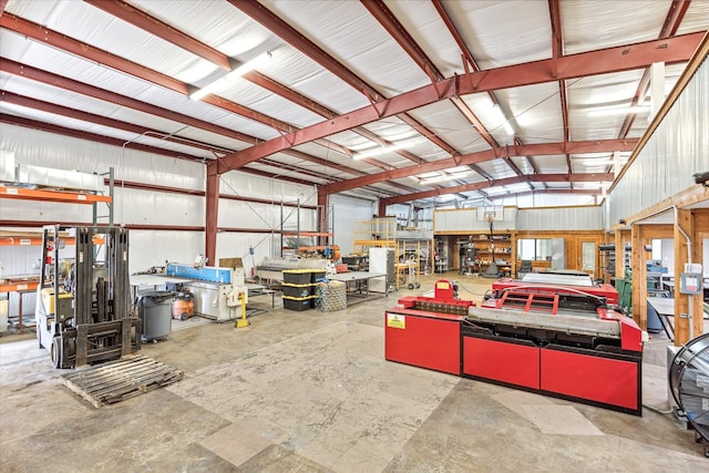 11126 Timber Crest Dr, Houston, TX 77065 - garage with a workshop area and metal wall
