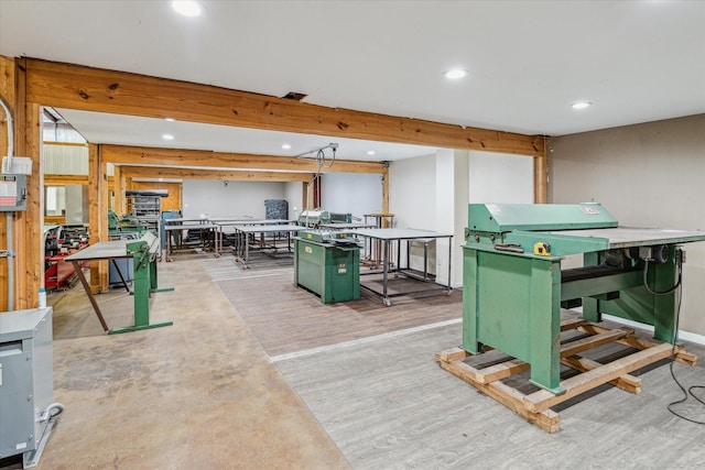 11126 Timber Crest Dr, Houston, TX 77065 - game room with recessed lighting, wood finished floors, a workshop area, and baseboards