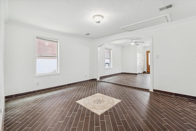 11126 Timber Crest Dr, Houston, TX 77065 - unfurnished room with wood finished floors, crown molding, arched walkways, and baseboards