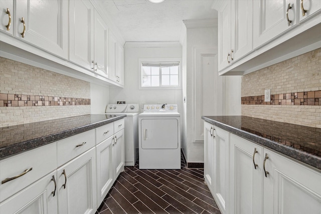11126 Timber Crest Dr, Houston, TX 77065 - clothes washing area with independent washer and dryer, ornamental molding, and cabinet space