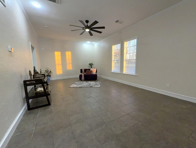 unfurnished room with ornamental molding, tile patterned floors, and ceiling fan