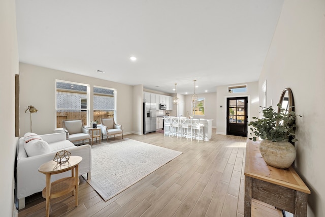 living room featuring light hardwood / wood-style floors