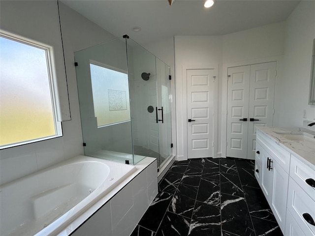 full bath featuring a garden tub, marble finish floor, vanity, a shower stall, and recessed lighting