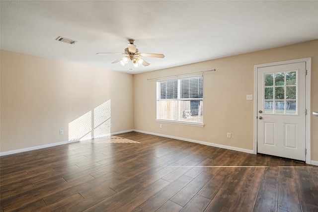 entrance foyer featuring dark hardwood / wood-style floors, a healthy amount of sunlight, and ceiling fan