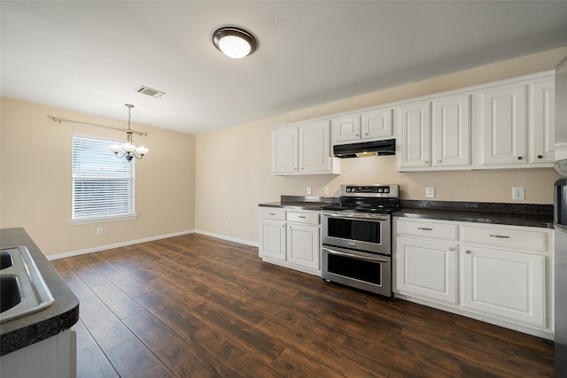 kitchen featuring white cabinets, a notable chandelier, dark hardwood / wood-style flooring, and stainless steel electric range oven