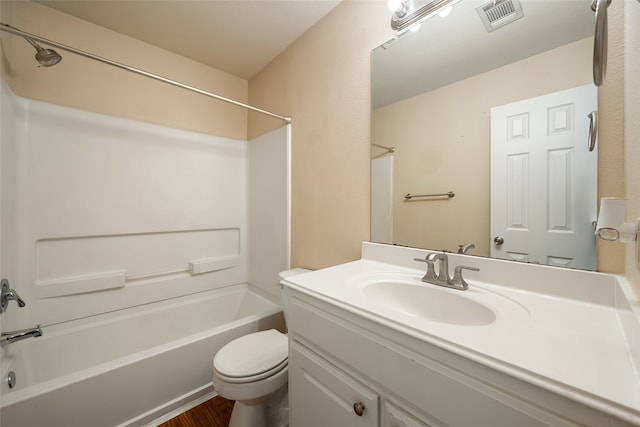 full bathroom with toilet, vanity, wood-type flooring, and shower / bath combination