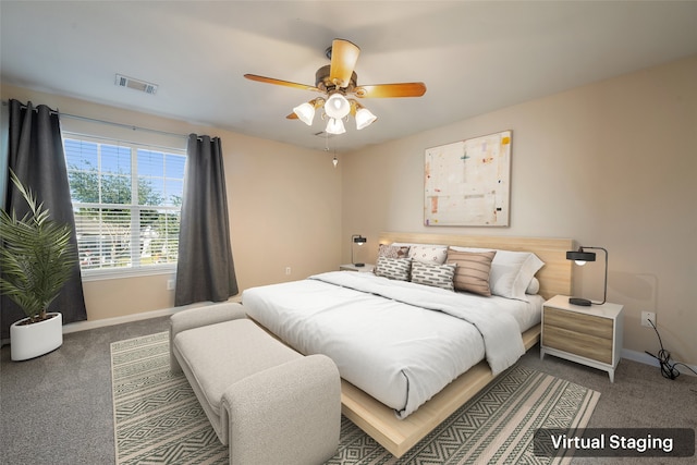 carpeted bedroom featuring ceiling fan