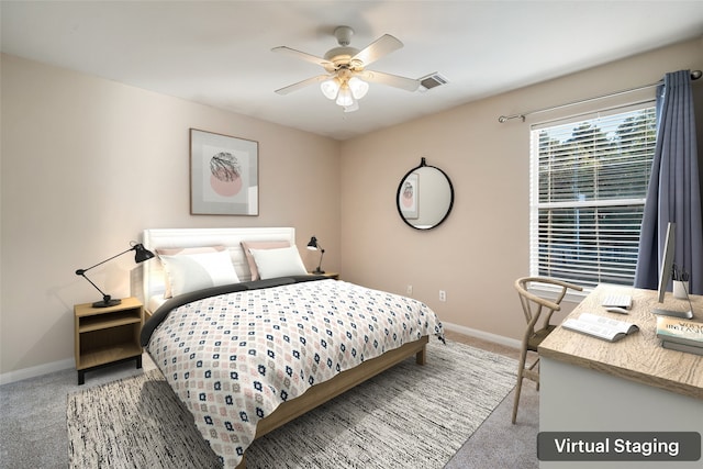 carpeted bedroom with ceiling fan