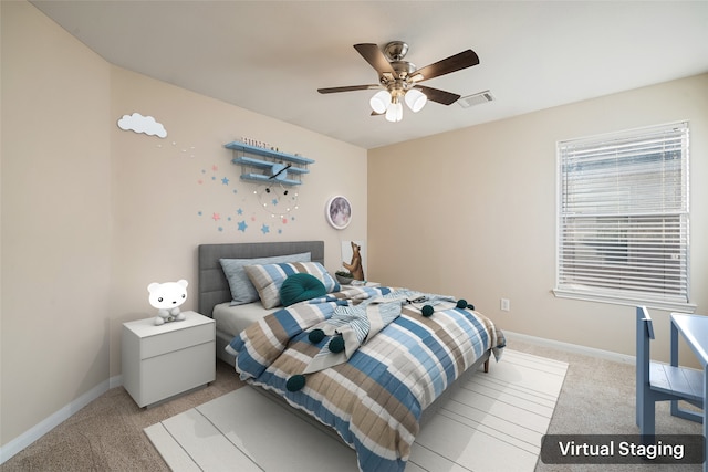 carpeted bedroom featuring ceiling fan