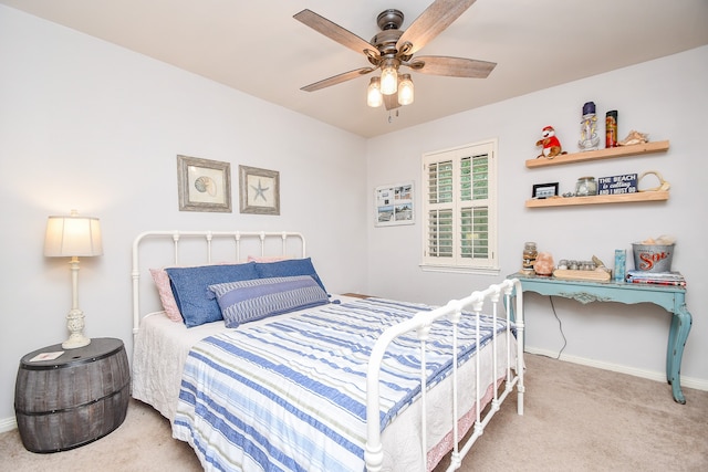 bedroom with light carpet and ceiling fan