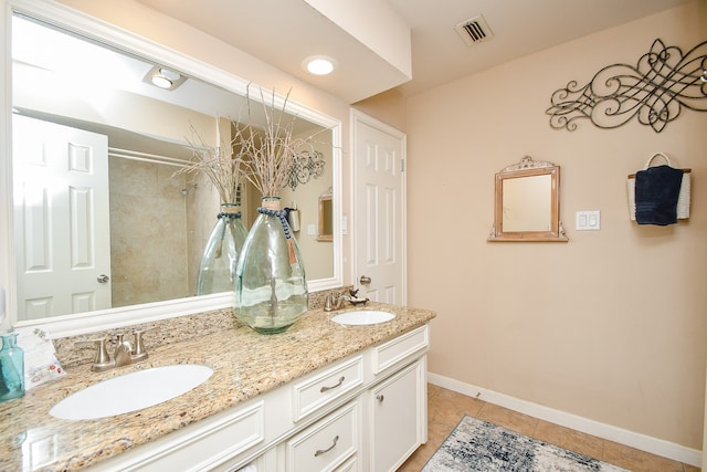 bathroom featuring vanity and tile patterned floors