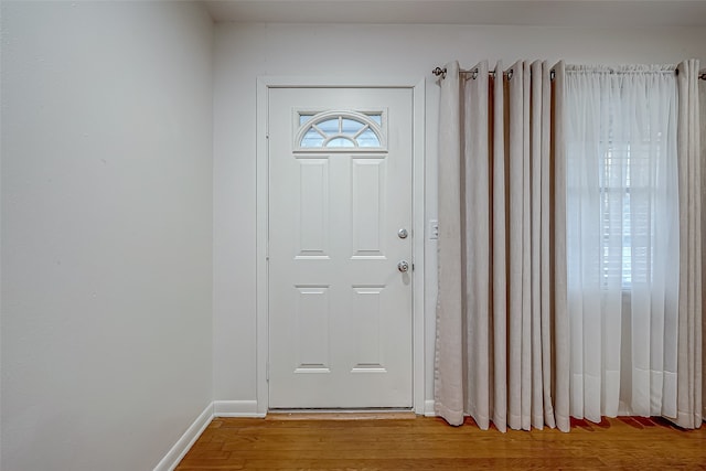 entrance foyer featuring hardwood / wood-style floors