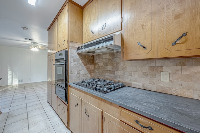 kitchen with backsplash, light tile patterned floors, black gas cooktop, and ceiling fan