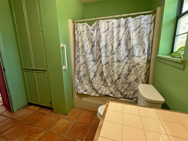 bathroom with toilet and shower / bathtub combination with curtain