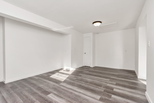 basement with dark wood-type flooring