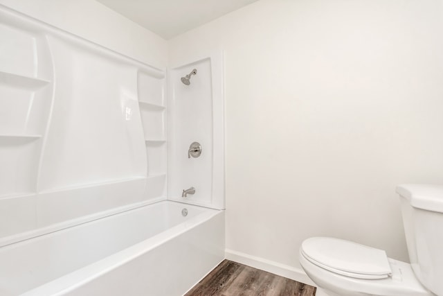 bathroom featuring hardwood / wood-style floors, toilet, and shower / bath combination