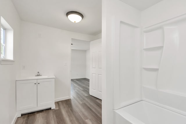 bathroom featuring vanity and hardwood / wood-style flooring