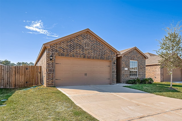 view of front facade with a garage and a front lawn