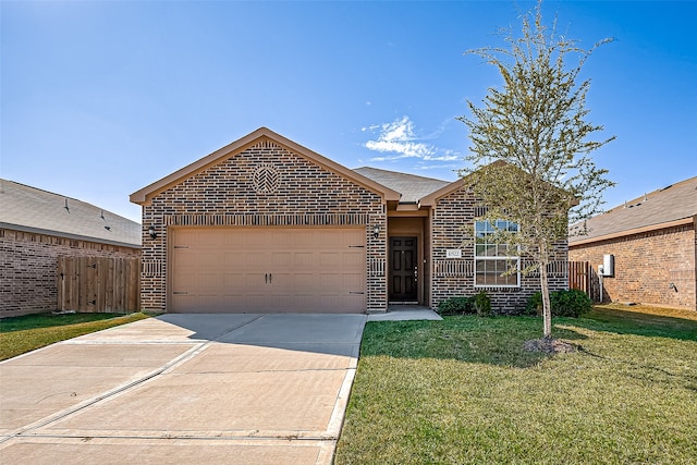 view of front facade with a front lawn and a garage