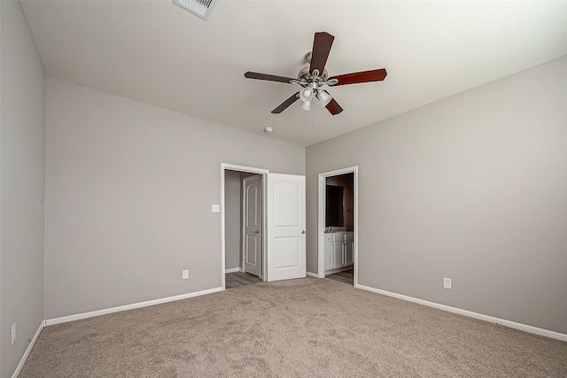 unfurnished room with carpet flooring and ceiling fan