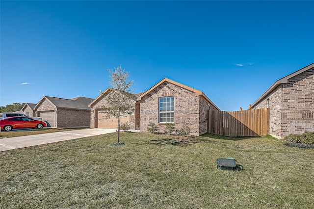 view of front facade with a front lawn and a garage