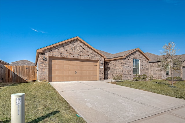 single story home with a front yard and a garage