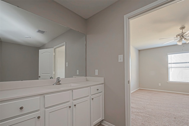 bathroom featuring vanity and ceiling fan