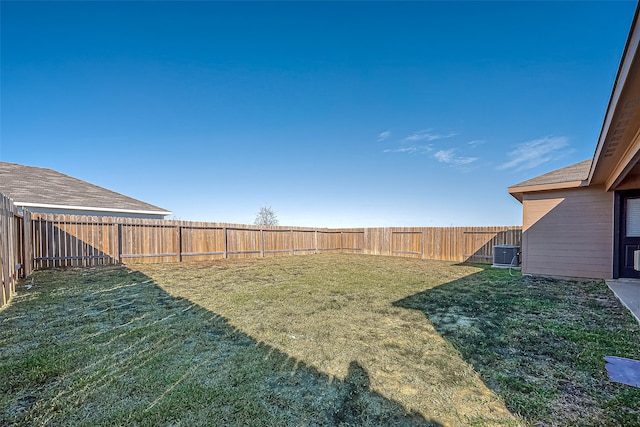 view of yard featuring central AC