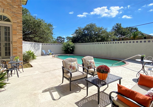 view of pool with a patio area