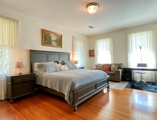 bedroom featuring wood-type flooring