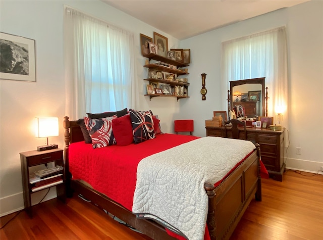 bedroom featuring hardwood / wood-style flooring