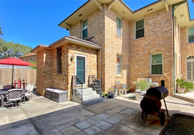 rear view of house with a patio area