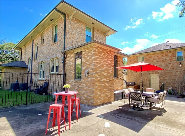 rear view of property with a patio area