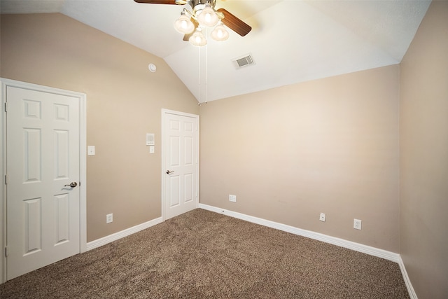 unfurnished bedroom featuring lofted ceiling, carpet flooring, and ceiling fan