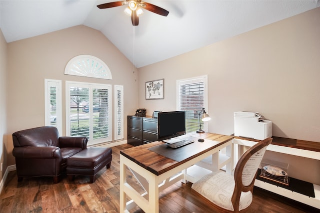 home office with ceiling fan, hardwood / wood-style flooring, and vaulted ceiling