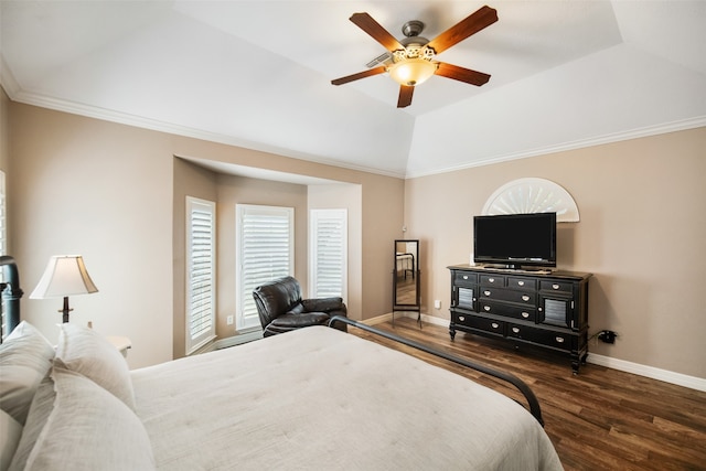 bedroom with lofted ceiling, dark wood-type flooring, crown molding, and ceiling fan