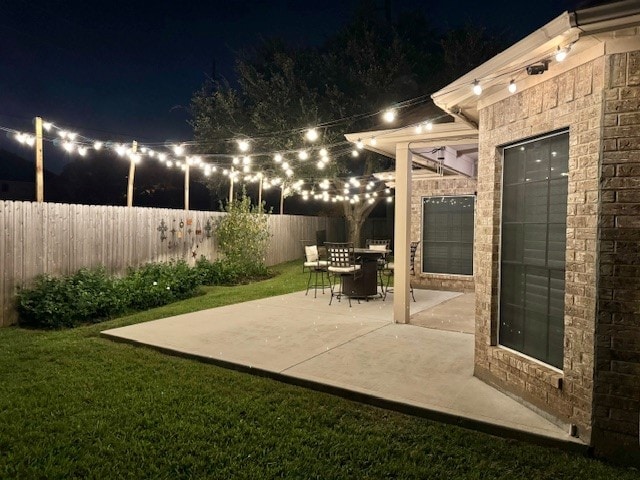 patio at twilight with a lawn