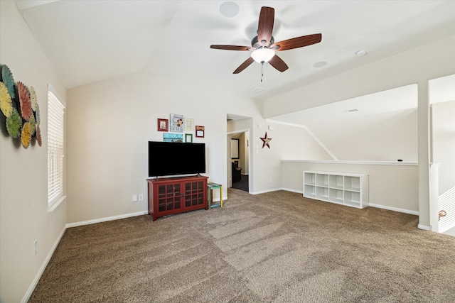 carpeted living room with lofted ceiling and ceiling fan