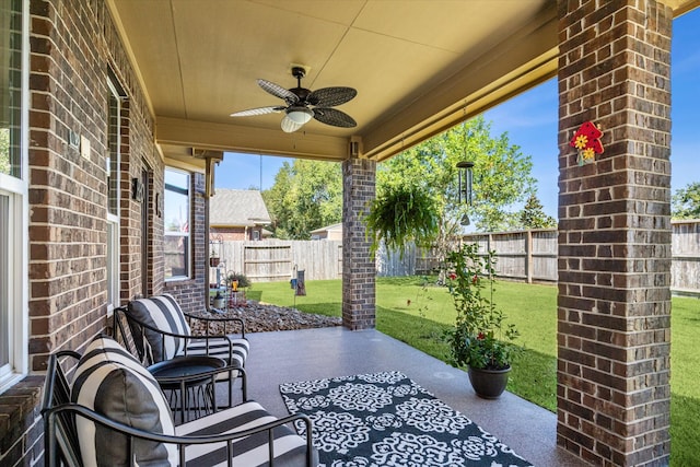 view of patio featuring ceiling fan