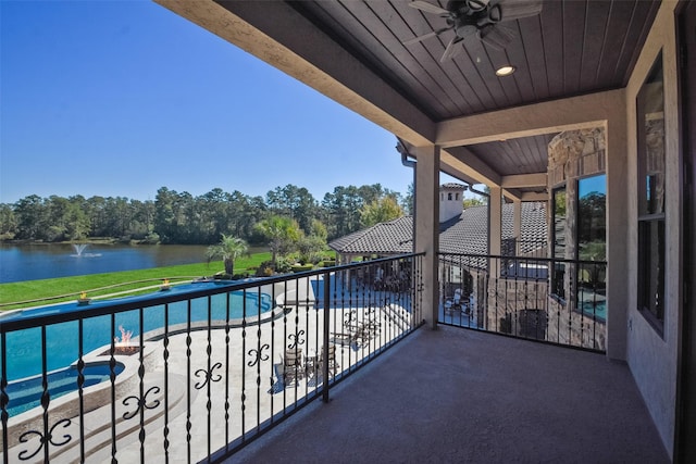 27918 Hansons Ct, Spring, TX 77386 - balcony featuring a water view, ceiling fan, and view of wooded area