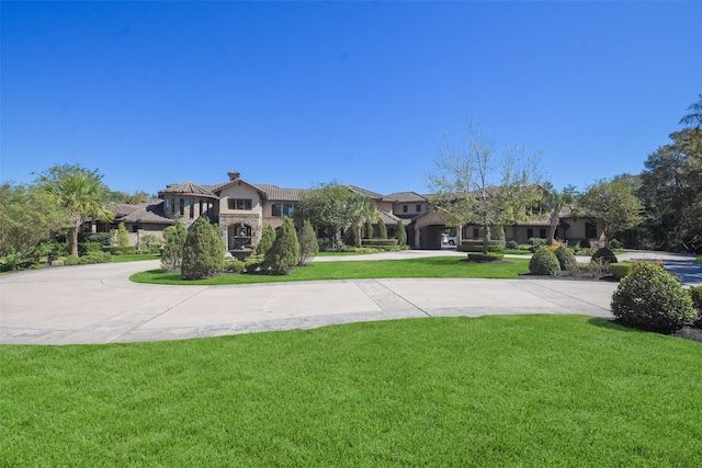 view of front facade with a front lawn