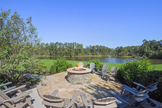 27918 Hansons Ct, Spring, TX 77386 - view of patio / terrace featuring an outdoor fire pit and a water view